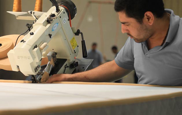 Tape edging of mattress